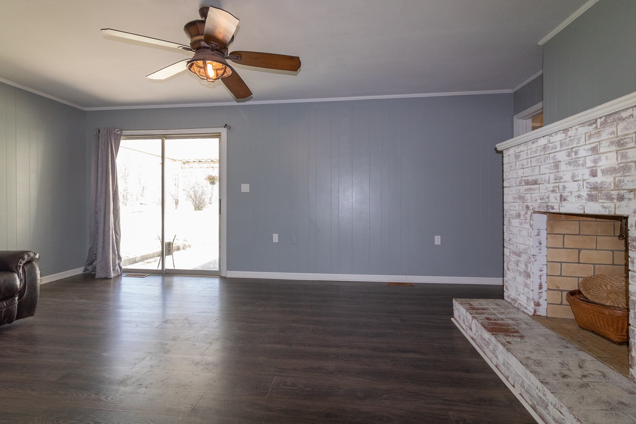 201 South Tunnel Road Portland, TN 37148 - Photo 27 of 41 a view of an empty room with a window and wooden floor