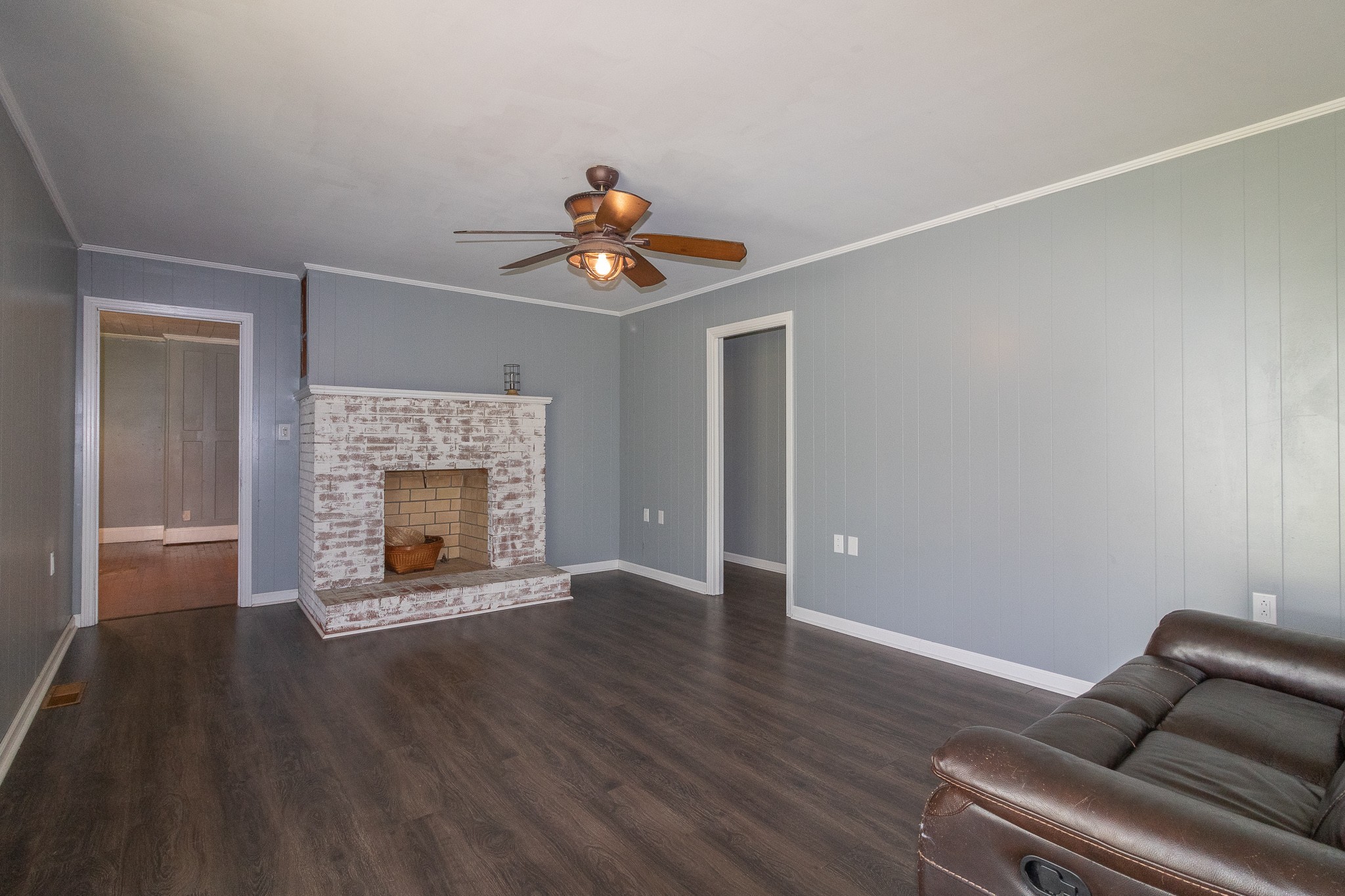 201 South Tunnel Road Portland, TN 37148 - Photo 28 of 41 a living room with furniture and a fireplace