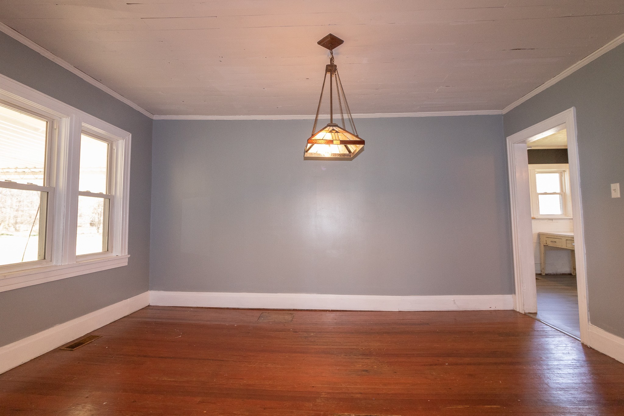 201 South Tunnel Road Portland, TN 37148 - Photo 10 of 41 a view of an empty room with wooden floor and a window