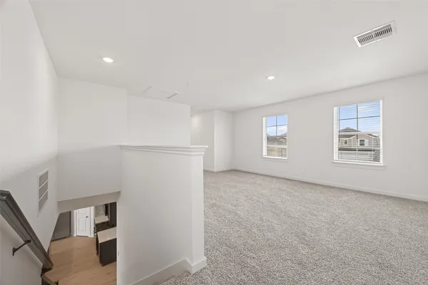 an empty room with a natural light