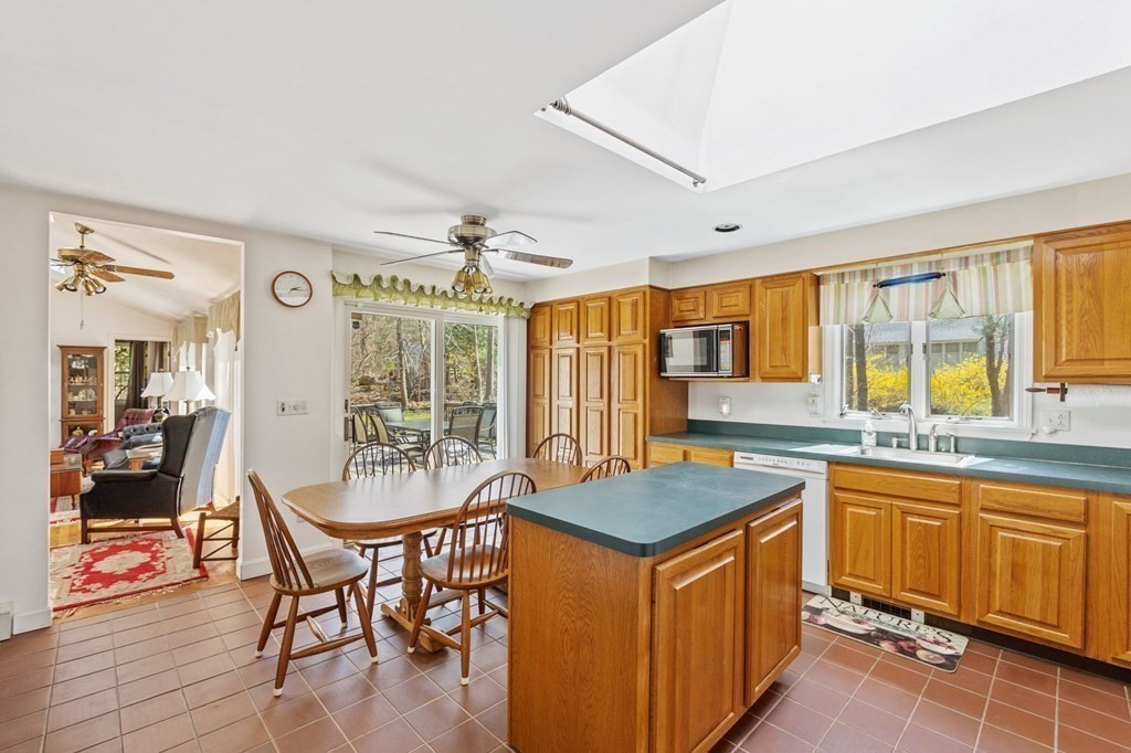 5 Bowler Road Wareham, MA 02571 - Photo 12 of 41 a open kitchen with a sink stove and wooden cabinets