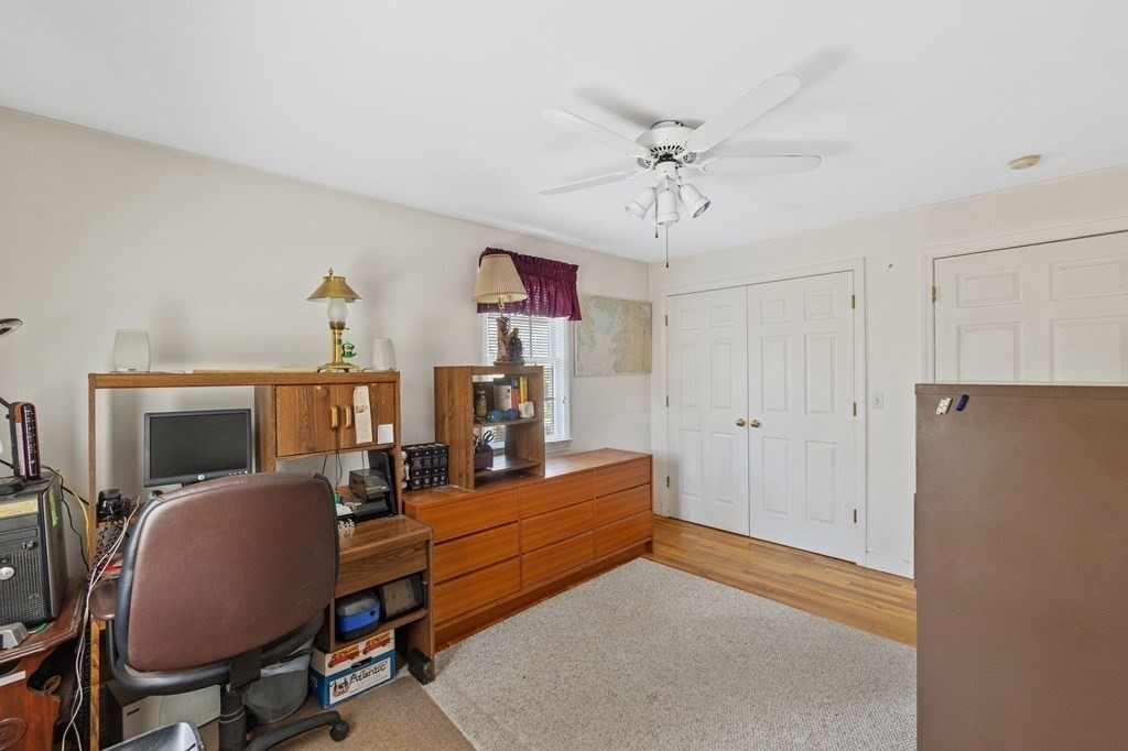 5 Bowler Road Wareham, MA 02571 - Photo 22 of 41 a view of a workspace with furniture and a chandelier