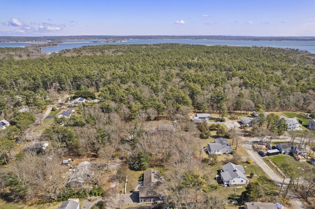 5 Bowler Road Wareham, MA 02571 - Photo 37 of 41 a view of a yard with an outdoor space and seating