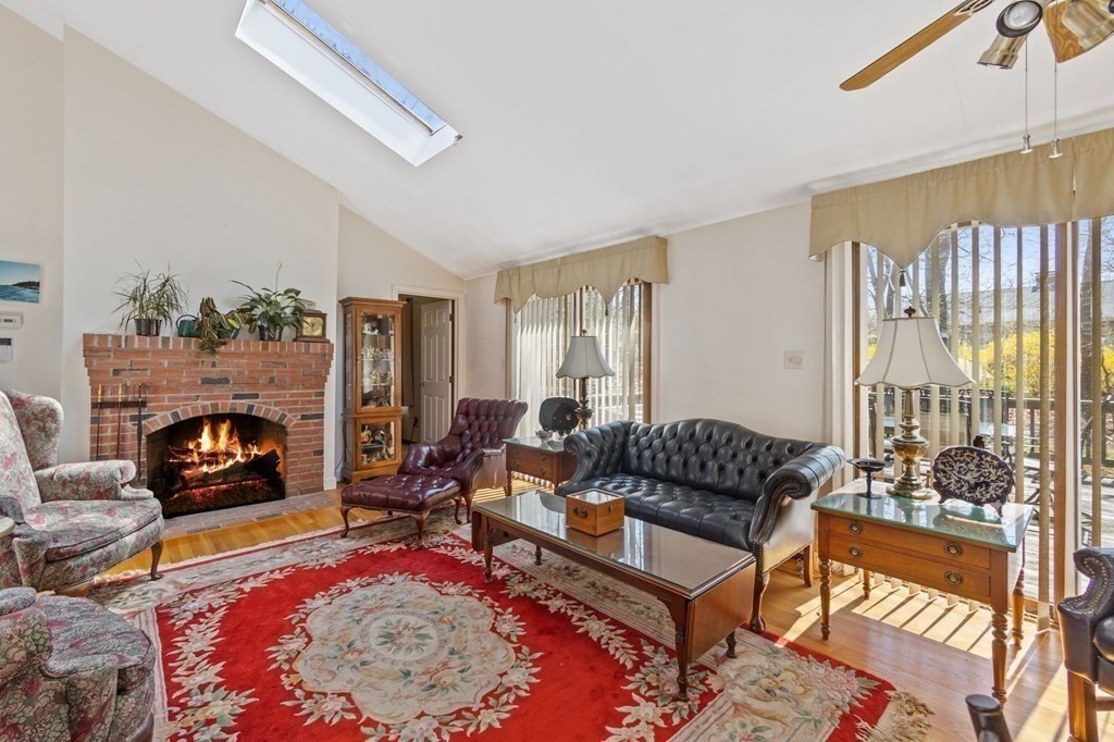 5 Bowler Road Wareham, MA 02571 - Photo 6 of 41 a living room with furniture and a fireplace
