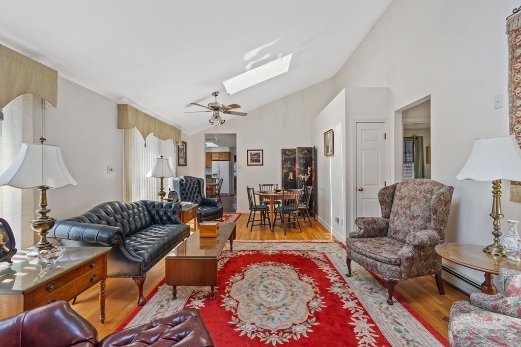 5 Bowler Road Wareham, MA 02571 - Photo 8 of 41 a living room with furniture a lamp and a rug