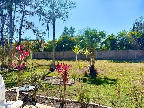 a garden view with a seating space