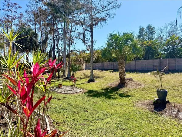 a view of a backyard with a fountain
