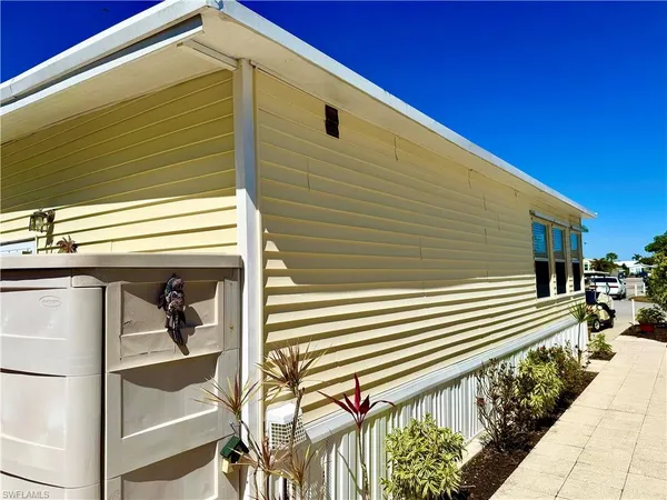 a front view of a house with a balcony