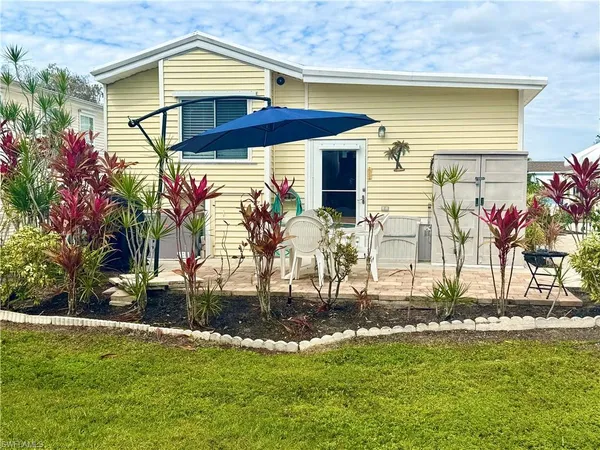 a view of a house with swimming pool