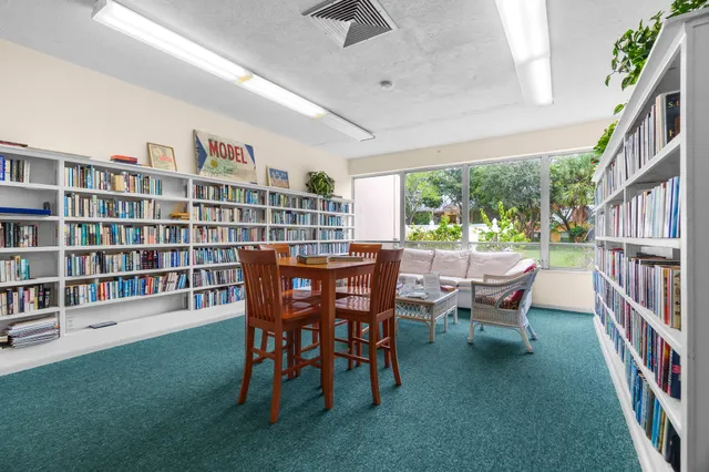 a bedroom with furniture and a gym equipment