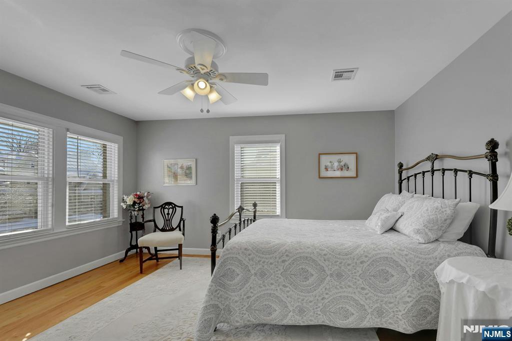 19 Hamilton Avenue Kearny, NJ 07032 - Photo 22 of 33 a bedroom with a bed chairs and a window