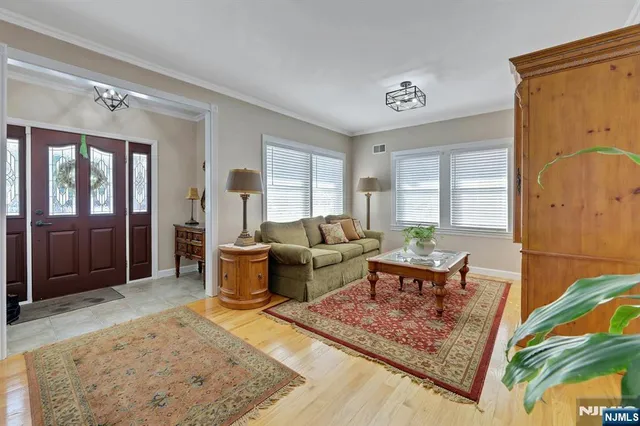 a living room with furniture and a table