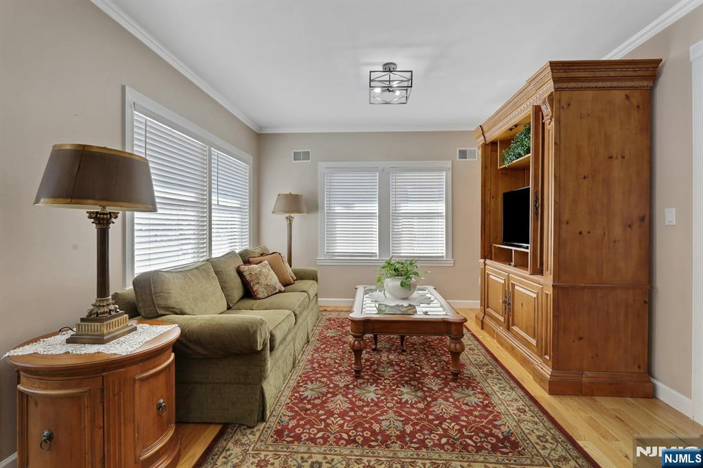 19 Hamilton Avenue Kearny, NJ 07032 - Photo 8 of 33 a living room with furniture and a window