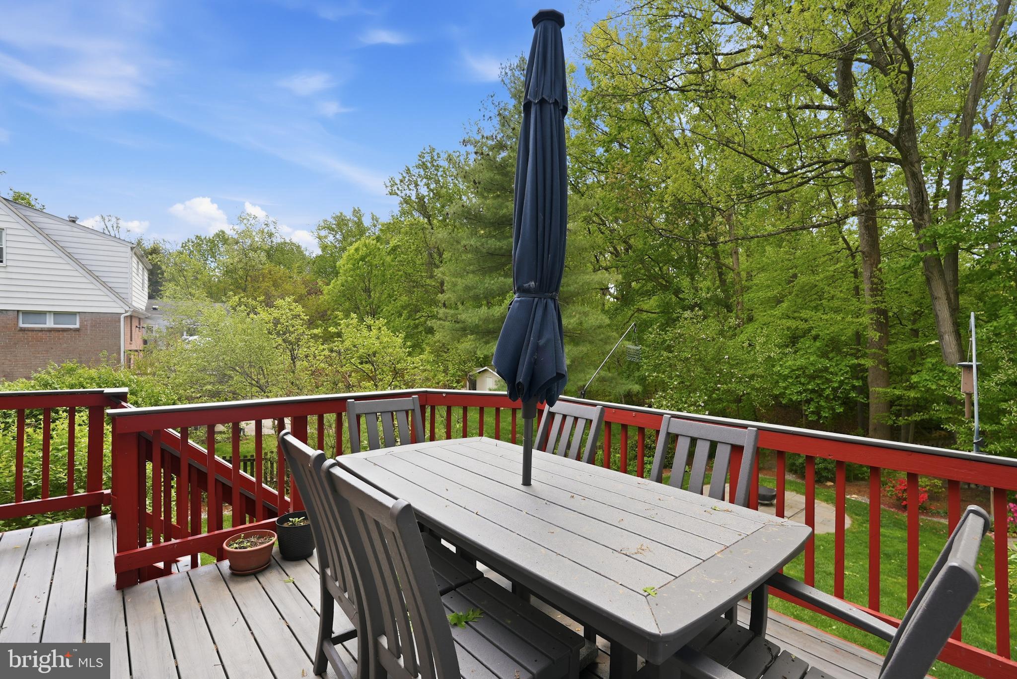 7006 Barnack Drive Springfield, VA 22152 - Photo 17 of 56 a view of a wooden deck with furniture