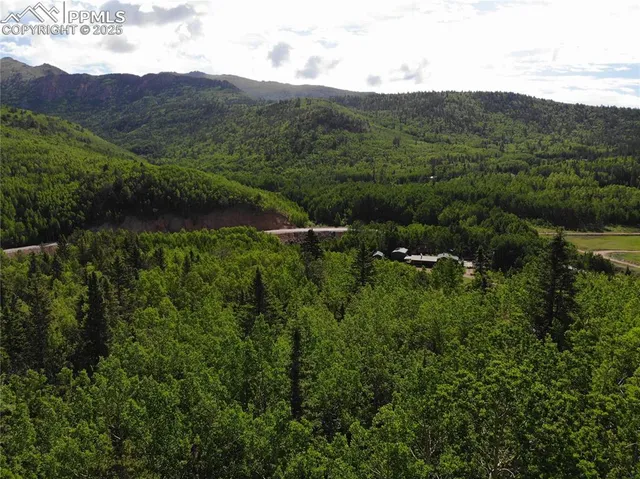 a view of a lake with mountains in the background