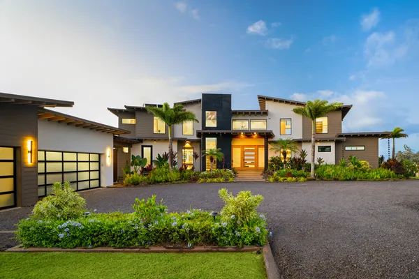 front view of a house with a yard