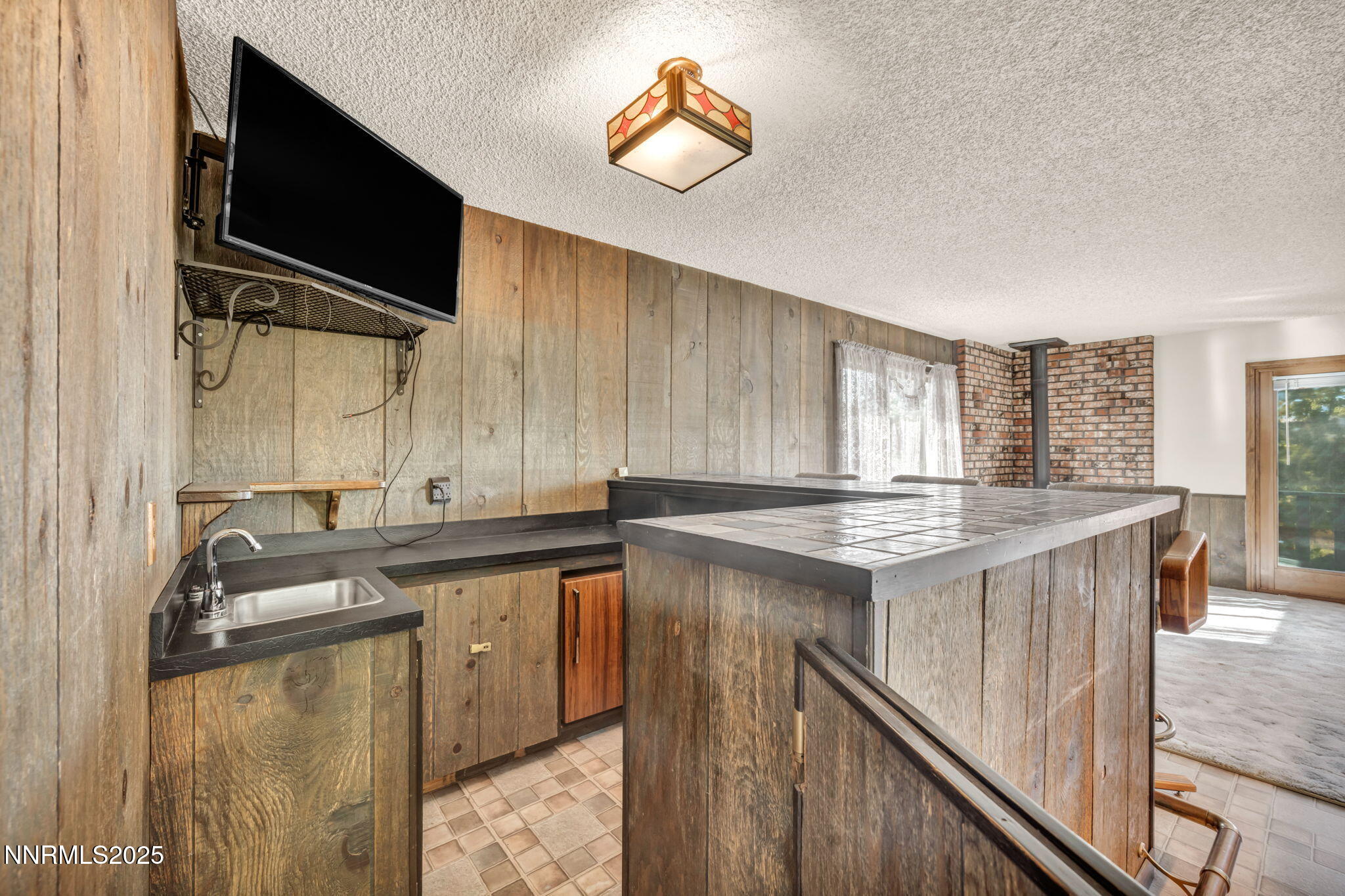3370 Shawnee Circle Reno, NV 89502 - Photo 29 of 78 a kitchen with a sink stove and cabinets