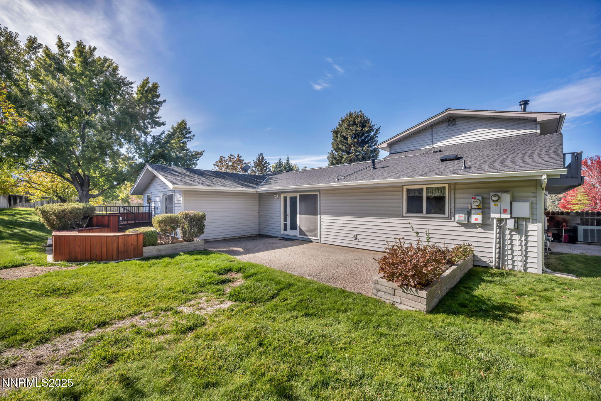 3370 Shawnee Circle Reno, NV 89502 - Photo 49 of 78 a front view of a house with a garden and yard