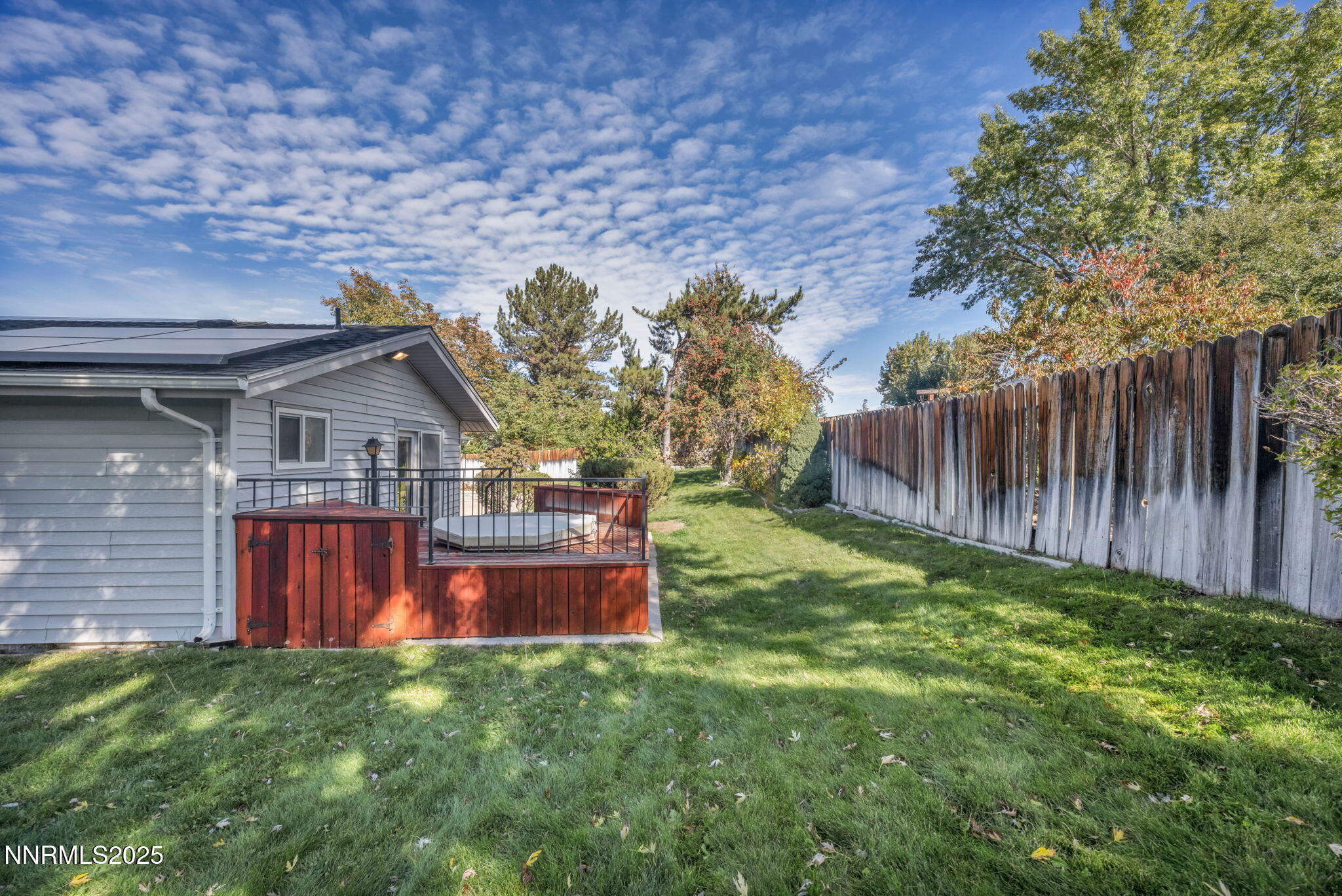 3370 Shawnee Circle Reno, NV 89502 - Photo 54 of 78 a backyard of a house with lots of green space and wooden fence