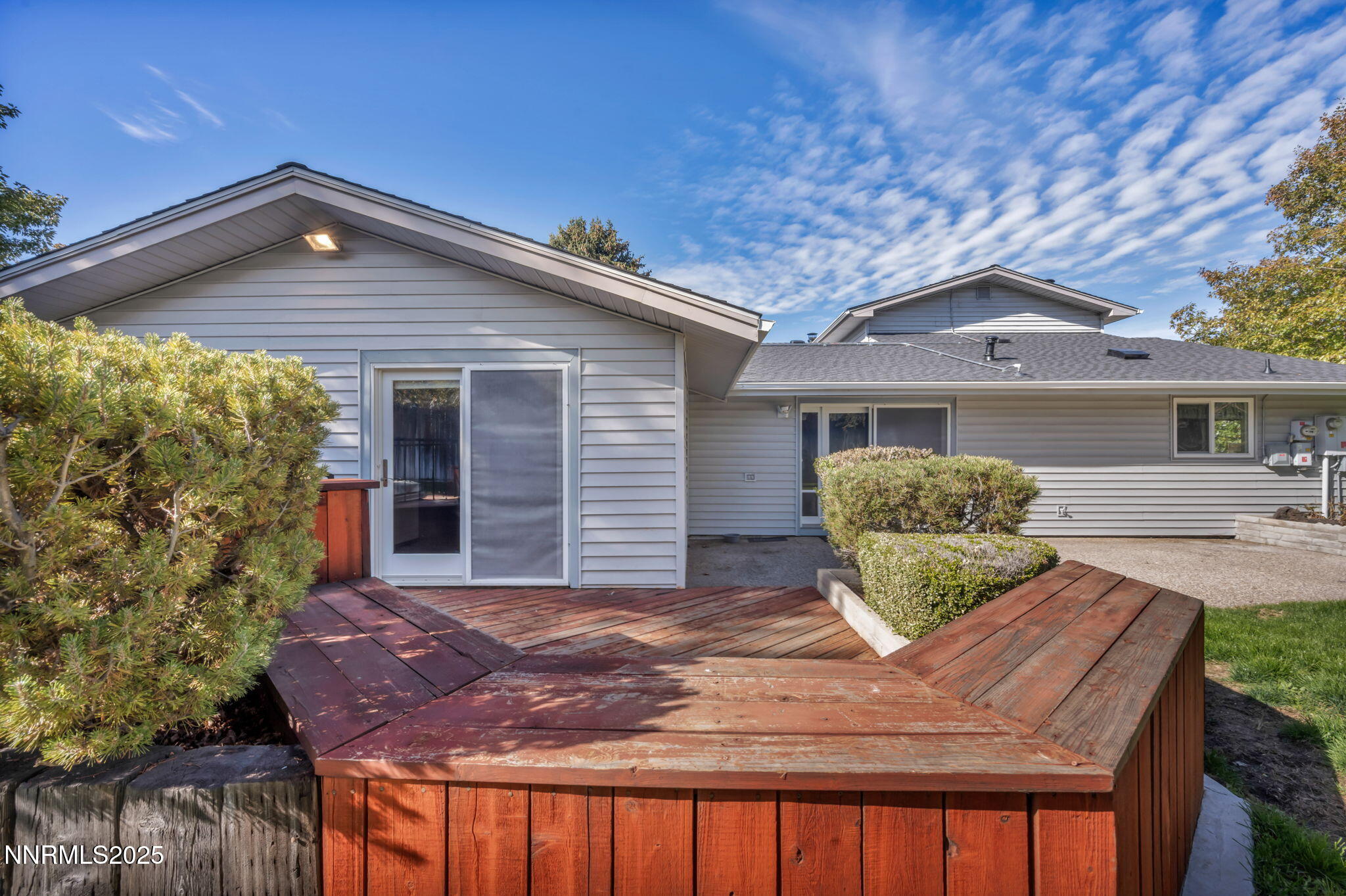 3370 Shawnee Circle Reno, NV 89502 - Photo 55 of 78 a front view of house with yard and trees in the background