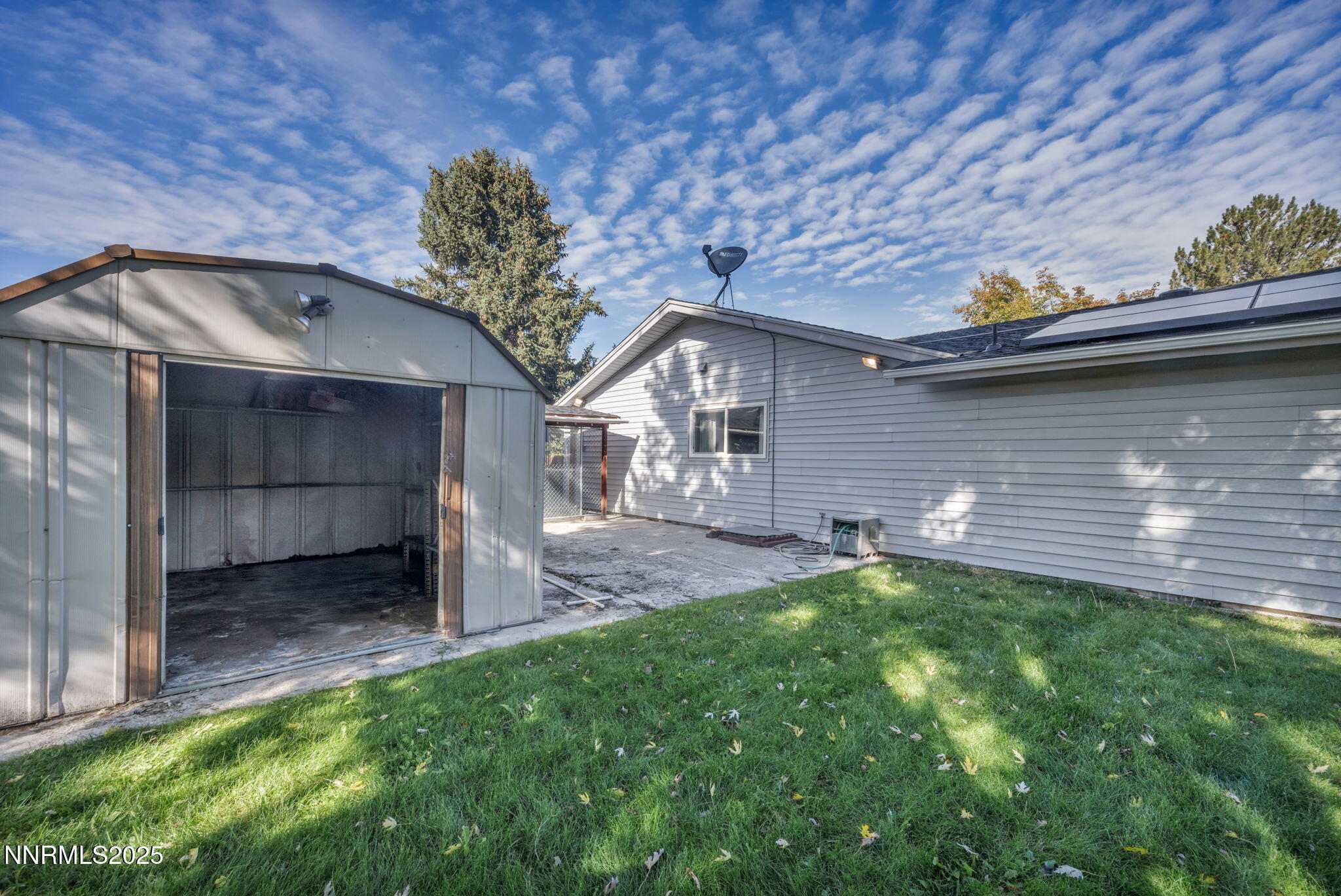 3370 Shawnee Circle Reno, NV 89502 - Photo 67 of 78 a front view of a house with a yard and garage