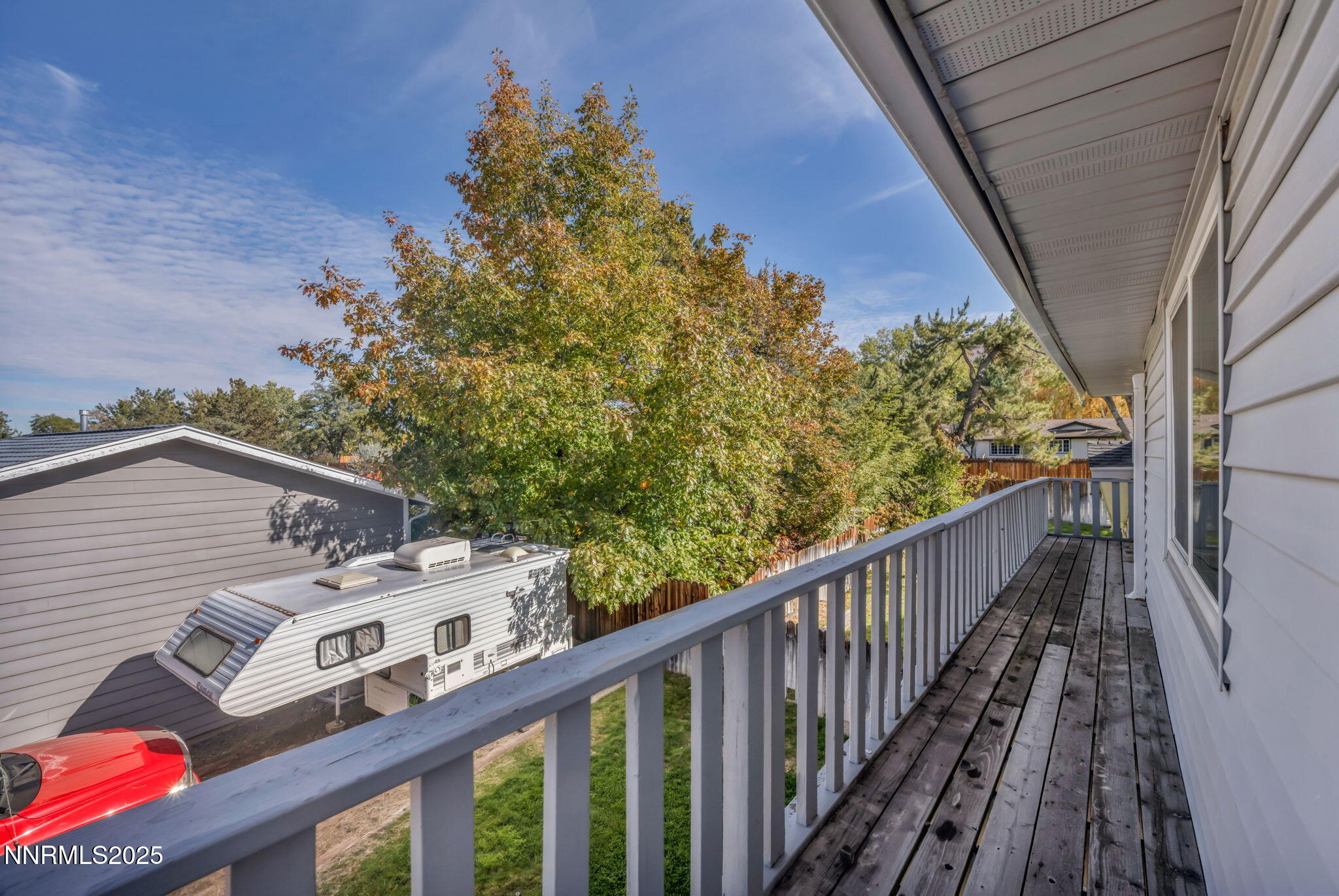 3370 Shawnee Circle Reno, NV 89502 - Photo 73 of 78 a view of a balcony with wooden fence and floor