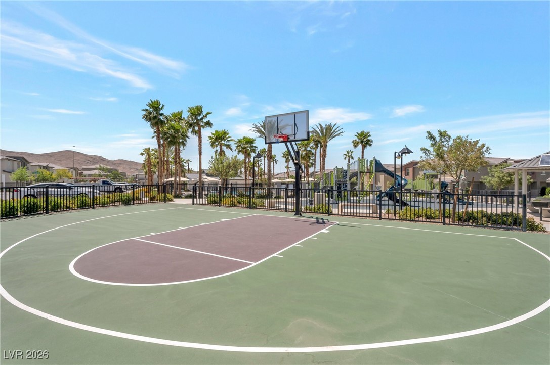 12348 Golden Wreath Road, Unit 1 Las Vegas, NV 89183 - Photo 30 of 37 View of basketball court featuring community basketball court and a residential view