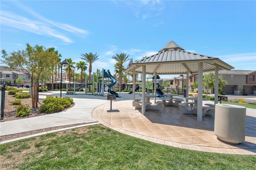 12348 Golden Wreath Road, Unit 1 Las Vegas, NV 89183 - Photo 31 of 37 View of property's community with a gazebo, a patio area, a residential view, and a yard