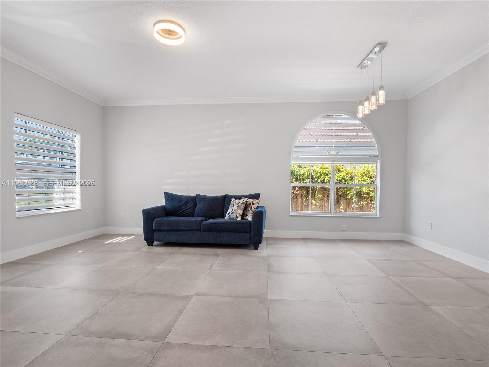 14833 Southwest 35th Lane Miami, FL 33185 - Photo 17 of 45 a room with furniture and a window