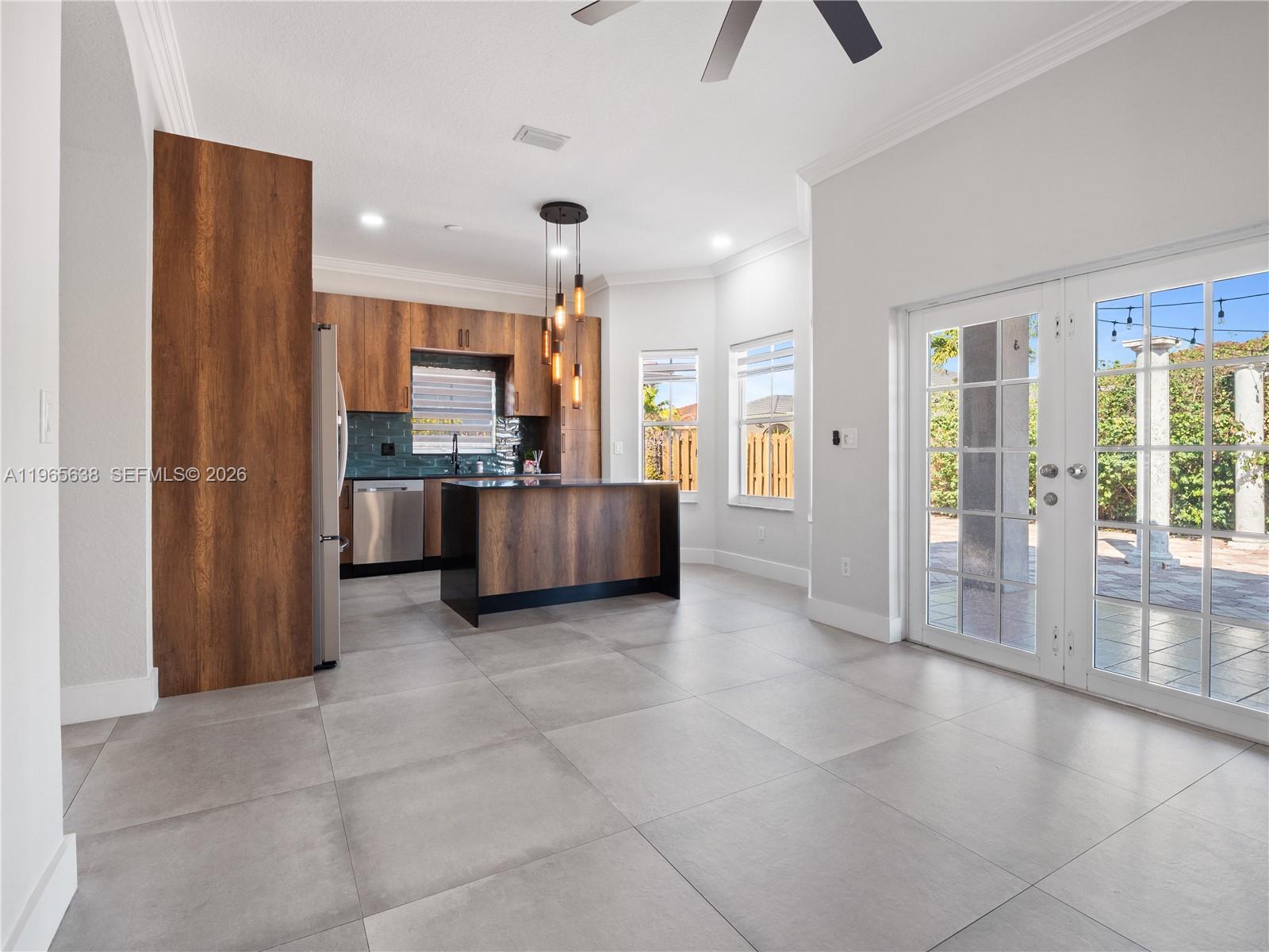 14833 Southwest 35th Lane Miami, FL 33185 - Photo 19 of 45 a view of kitchen and window