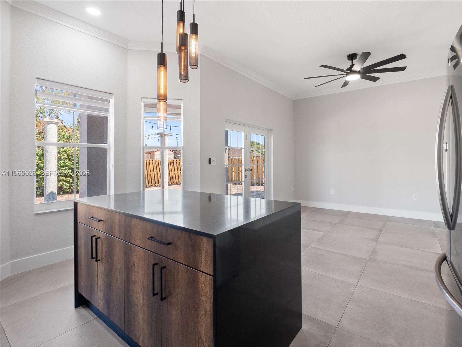 14833 Southwest 35th Lane Miami, FL 33185 - Photo 24 of 45 a kitchen with stainless steel appliances granite countertop a sink and a granite counter tops