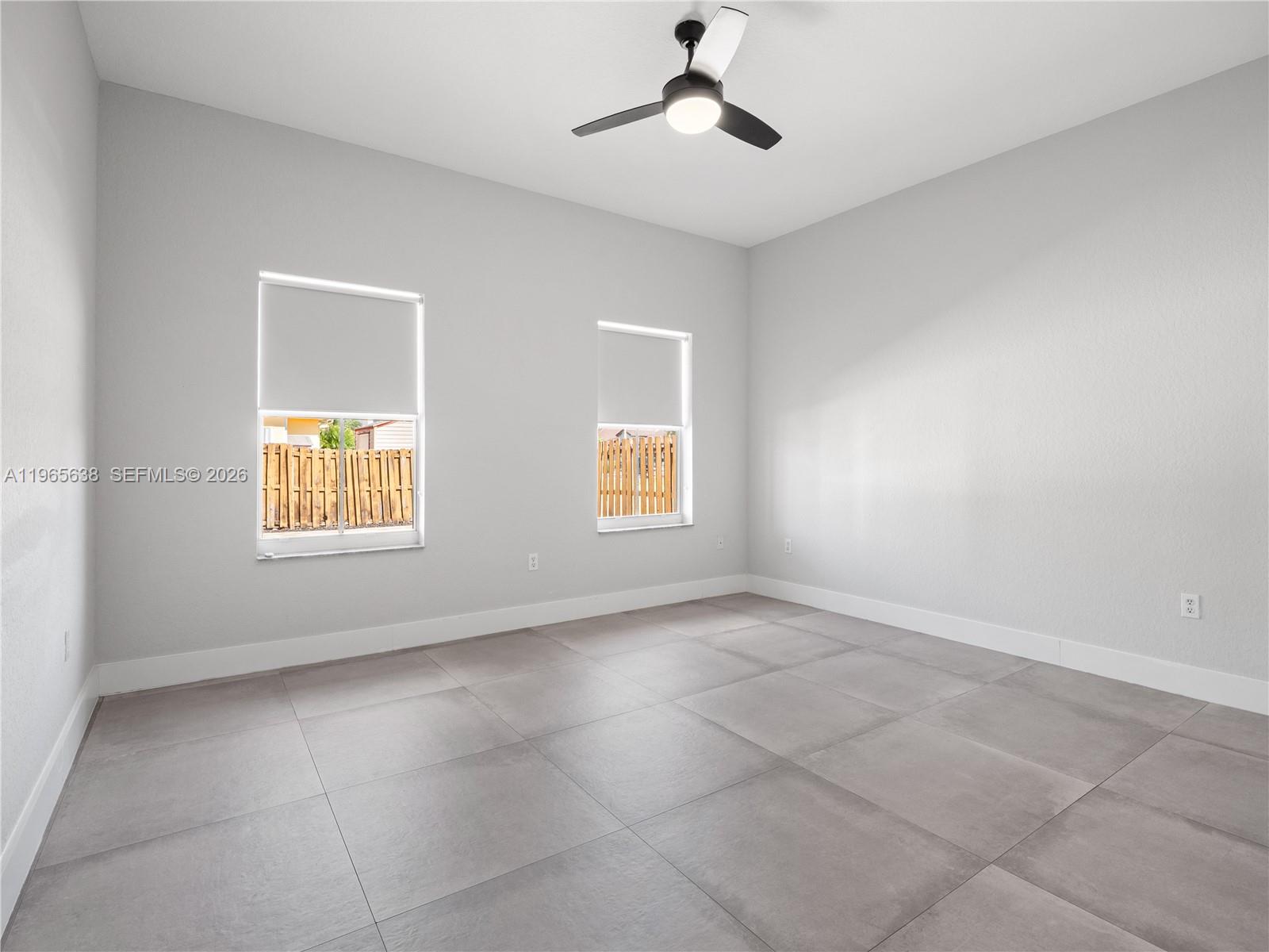 14833 Southwest 35th Lane Miami, FL 33185 - Photo 28 of 45 a view of an empty room with a window