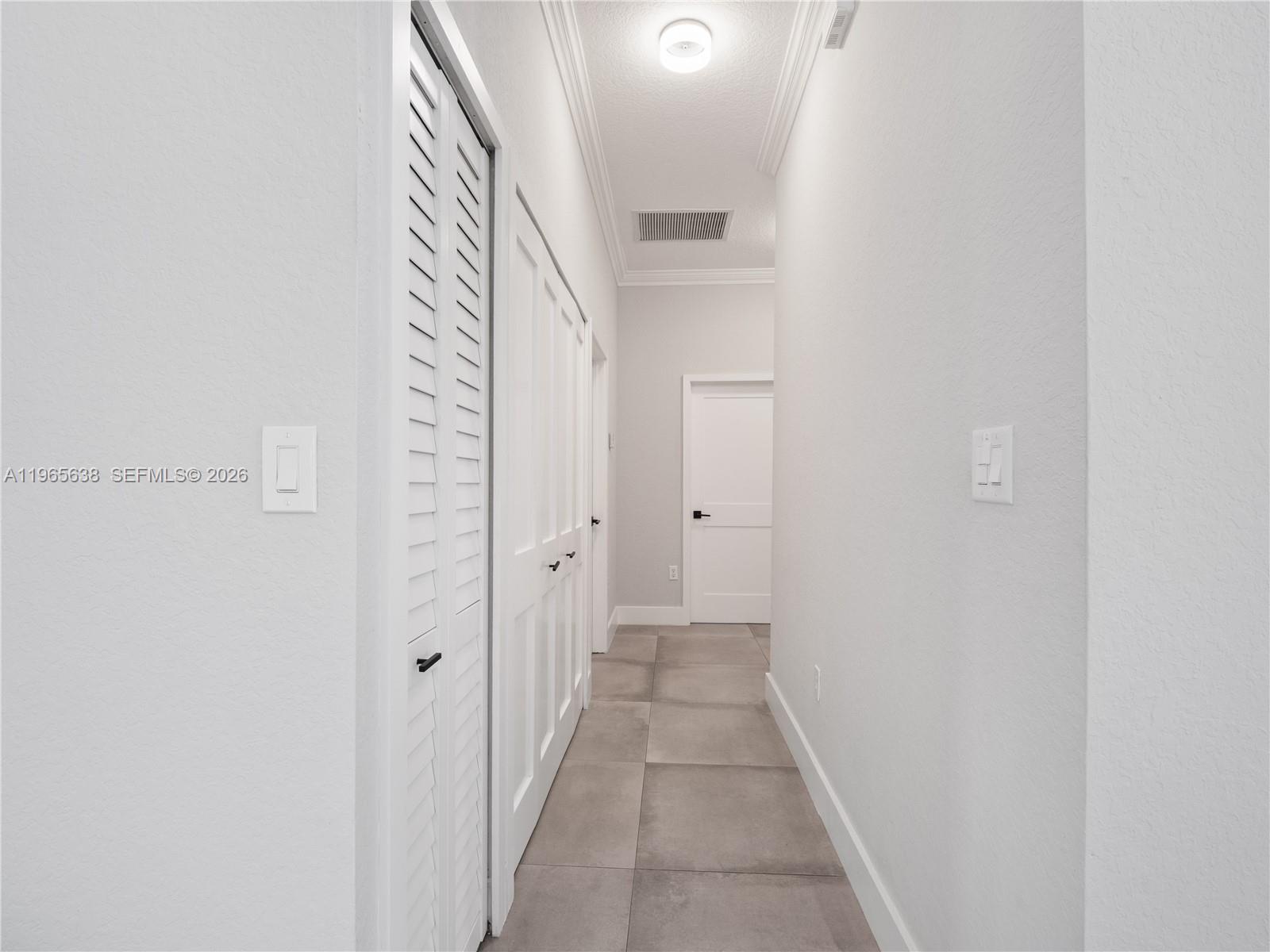 14833 Southwest 35th Lane Miami, FL 33185 - Photo 38 of 45 a view of a room with door