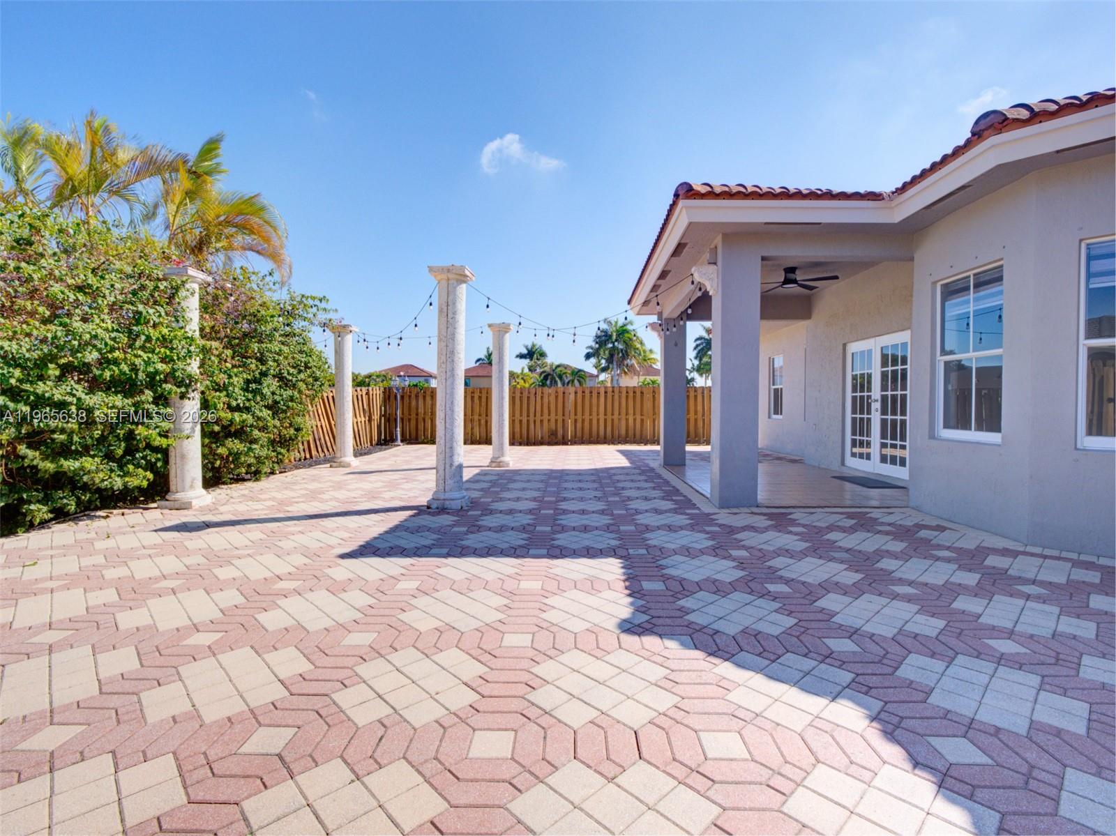 14833 Southwest 35th Lane Miami, FL 33185 - Photo 42 of 45 a front view of a house with a yard
