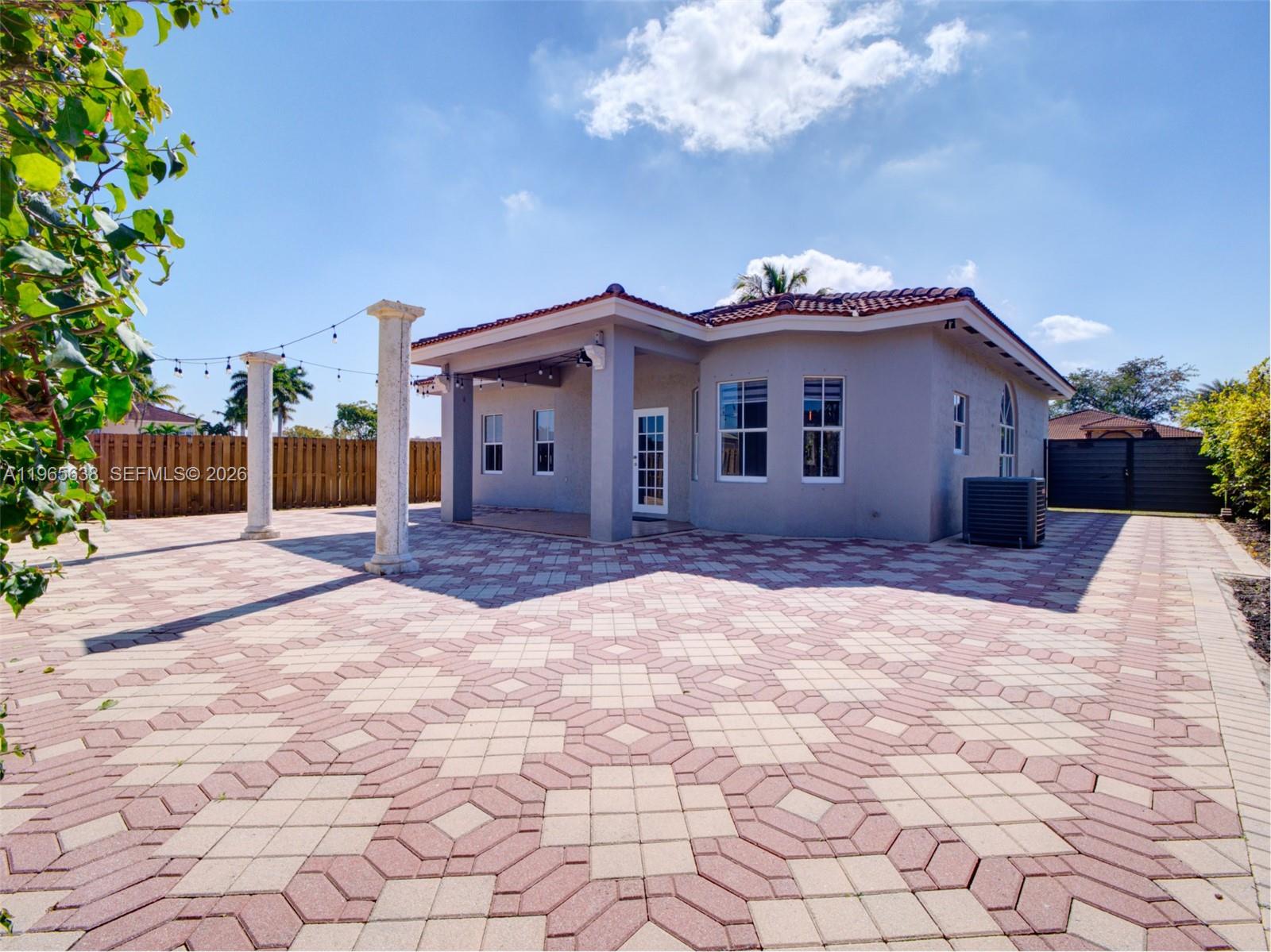 14833 Southwest 35th Lane Miami, FL 33185 - Photo 43 of 45 a view of a house with a yard