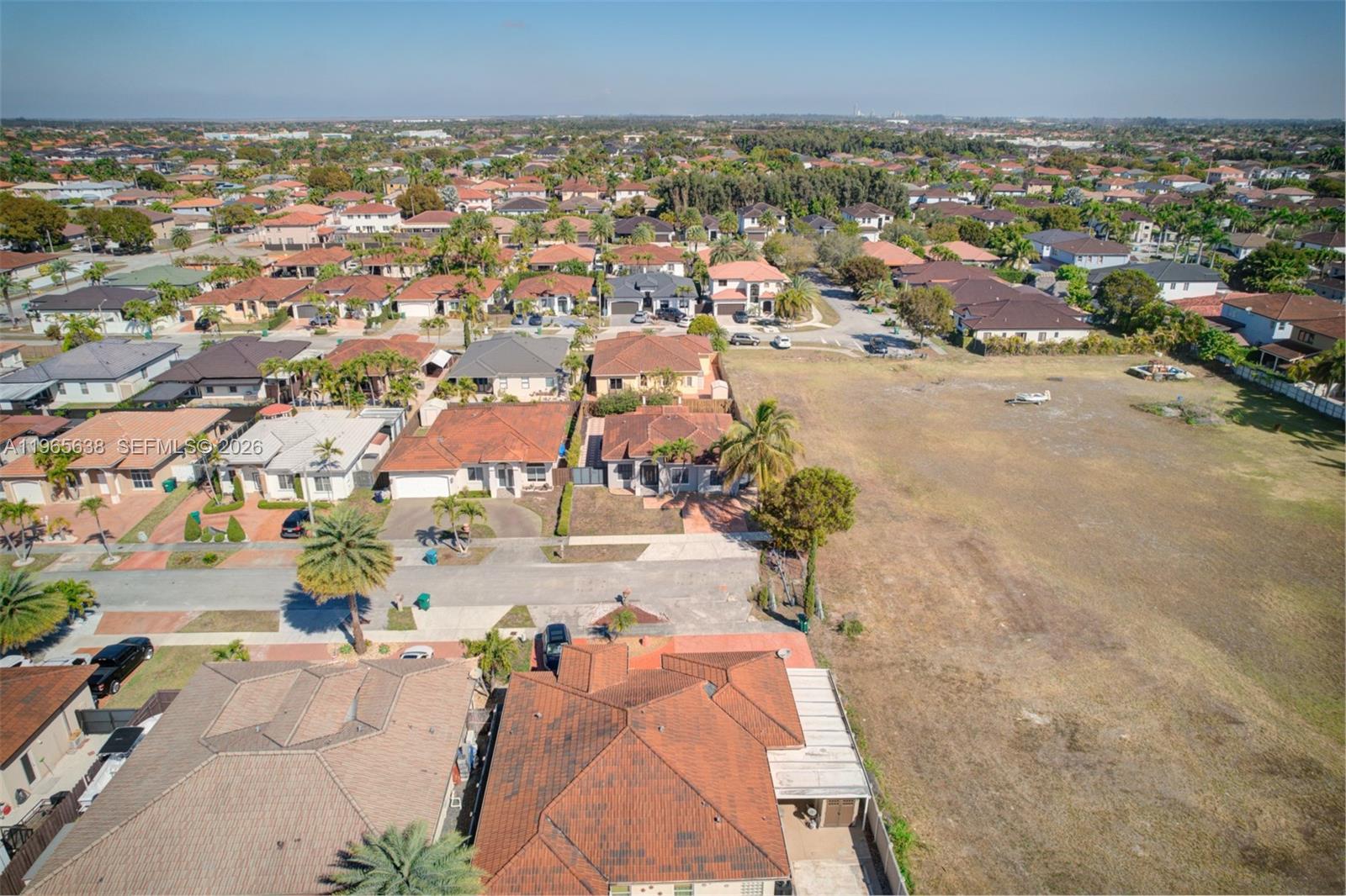 14833 Southwest 35th Lane Miami, FL 33185 - Photo 5 of 45 an aerial view of a house with a yard