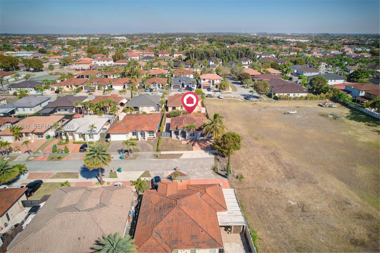14833 Southwest 35th Lane Miami, FL 33185 - Photo 6 of 45 an aerial view of residential houses with outdoor space