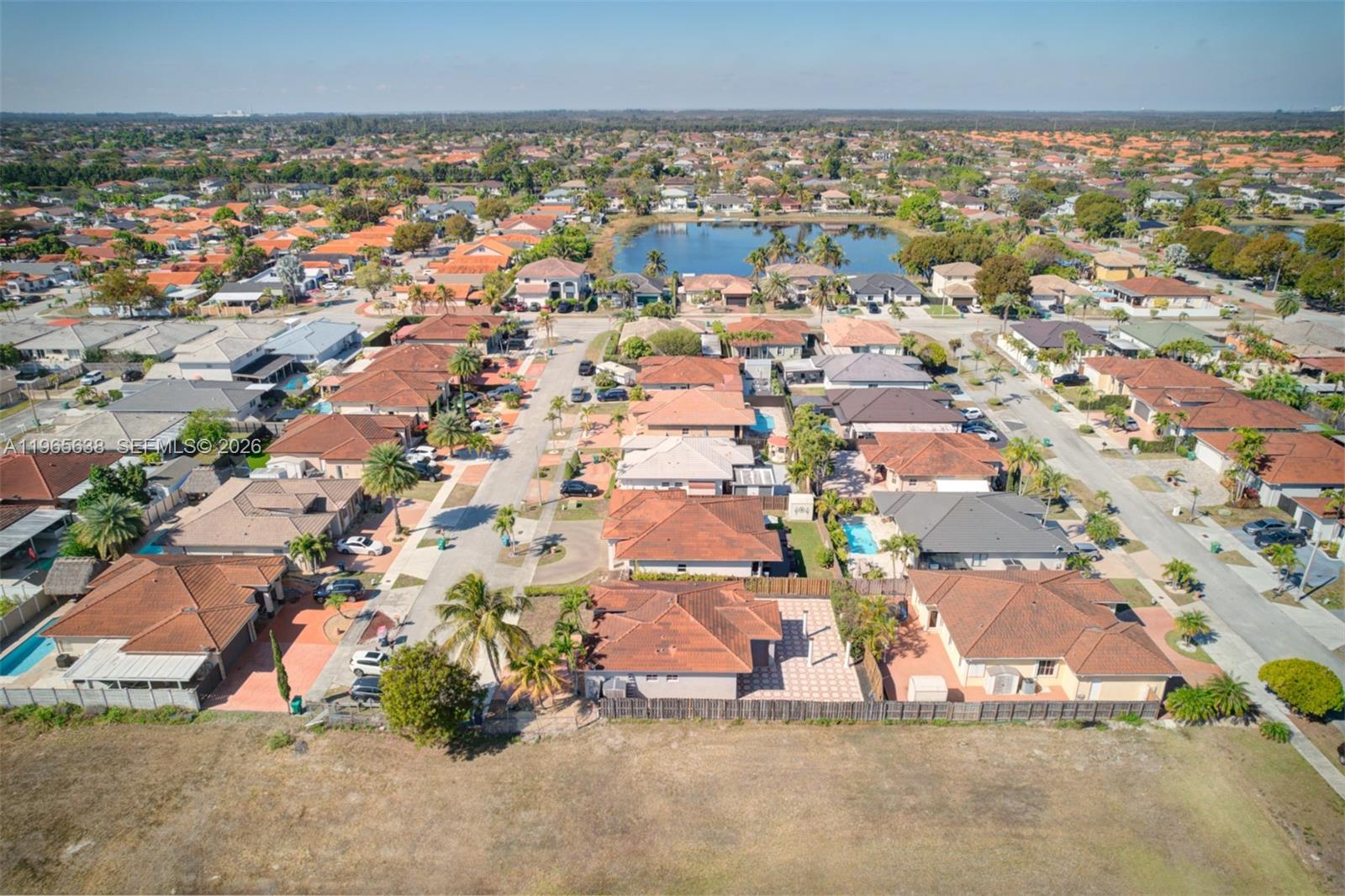 14833 Southwest 35th Lane Miami, FL 33185 - Photo 8 of 45 an aerial view of a houses with a yard