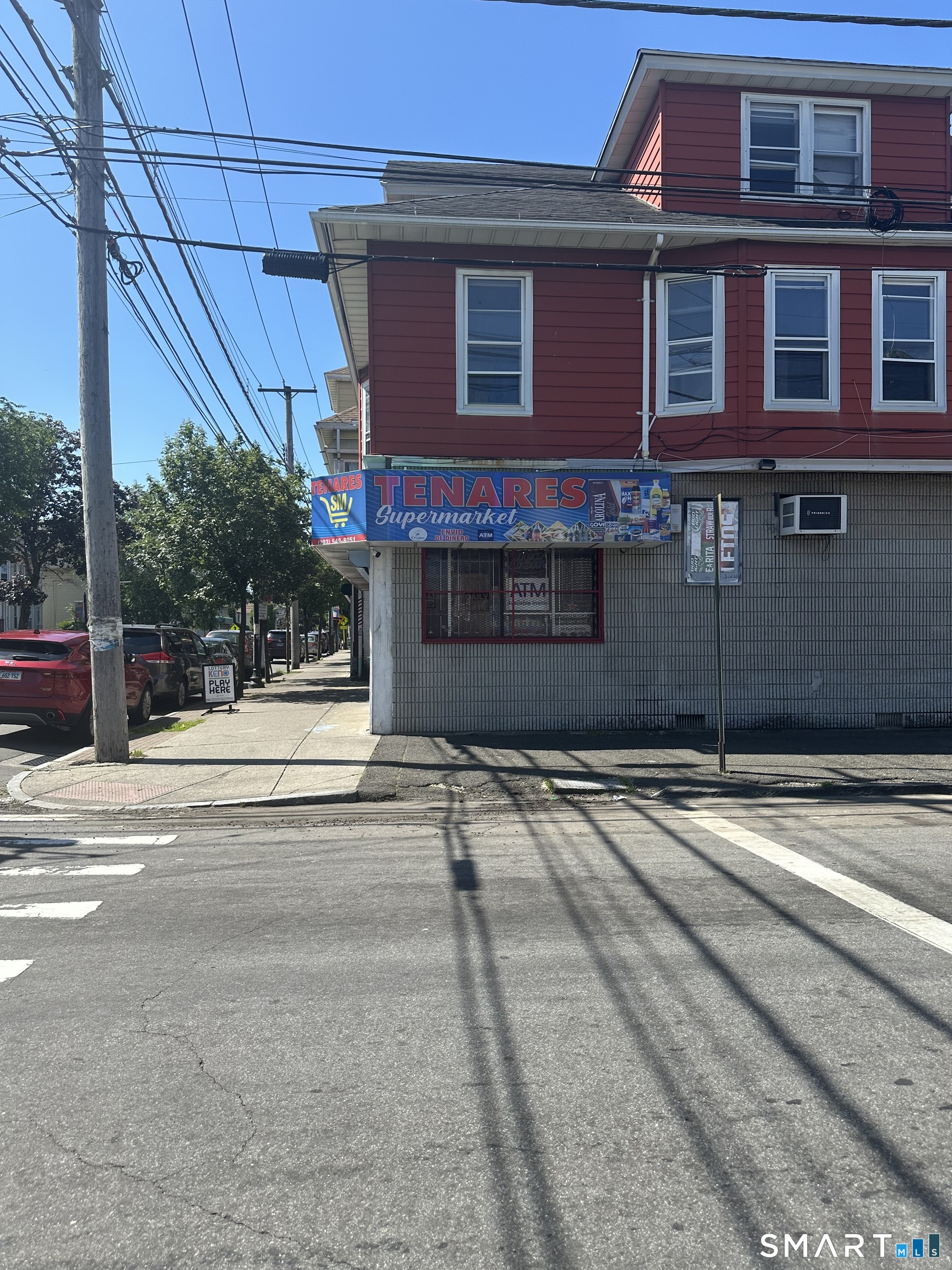 1365 East Main Street Bridgeport, CT 06608 - Photo 3 of 40 a view of a house with a street