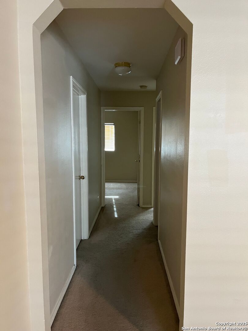 8011 Rio NIEBLA San Antonio, TX 78249 - Photo 12 of 18 a view of a hallway