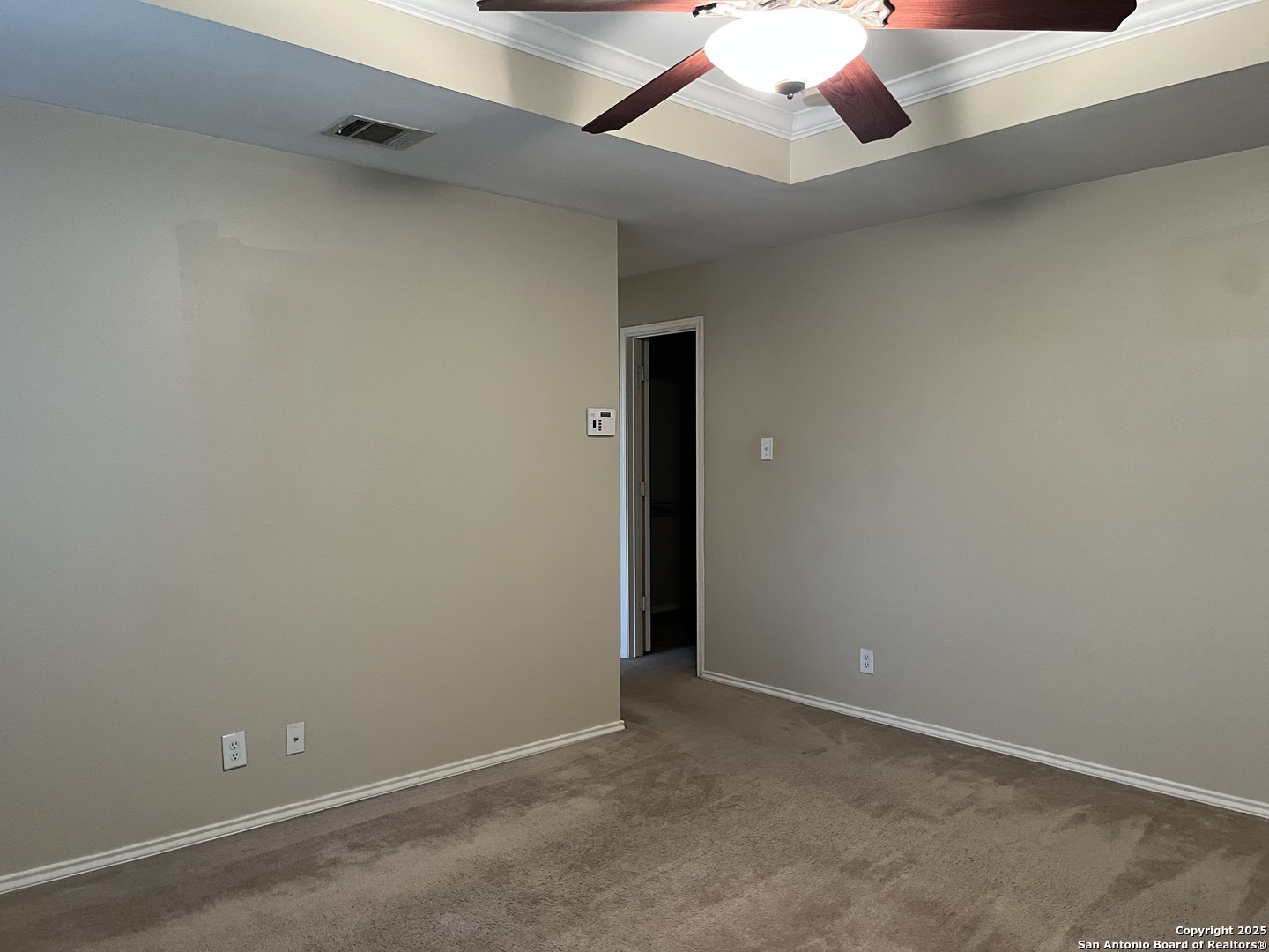 8011 Rio NIEBLA San Antonio, TX 78249 - Photo 16 of 18 an empty room with a ceiling fan and fan