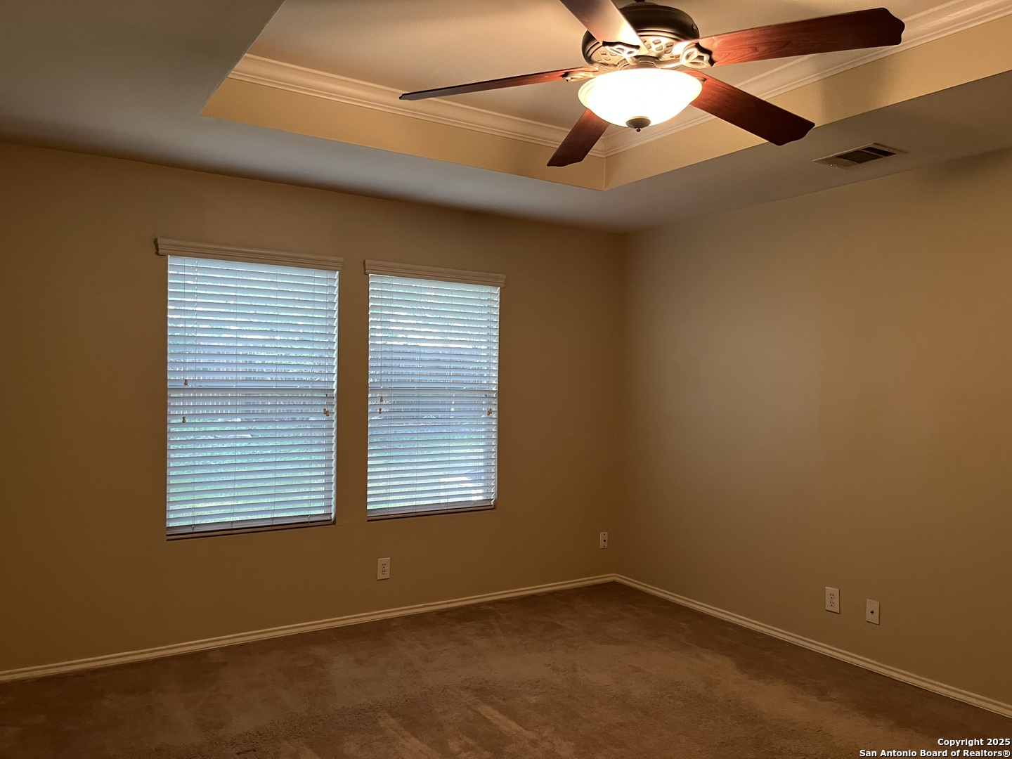 8011 Rio NIEBLA San Antonio, TX 78249 - Photo 17 of 18 an empty room with windows and fan