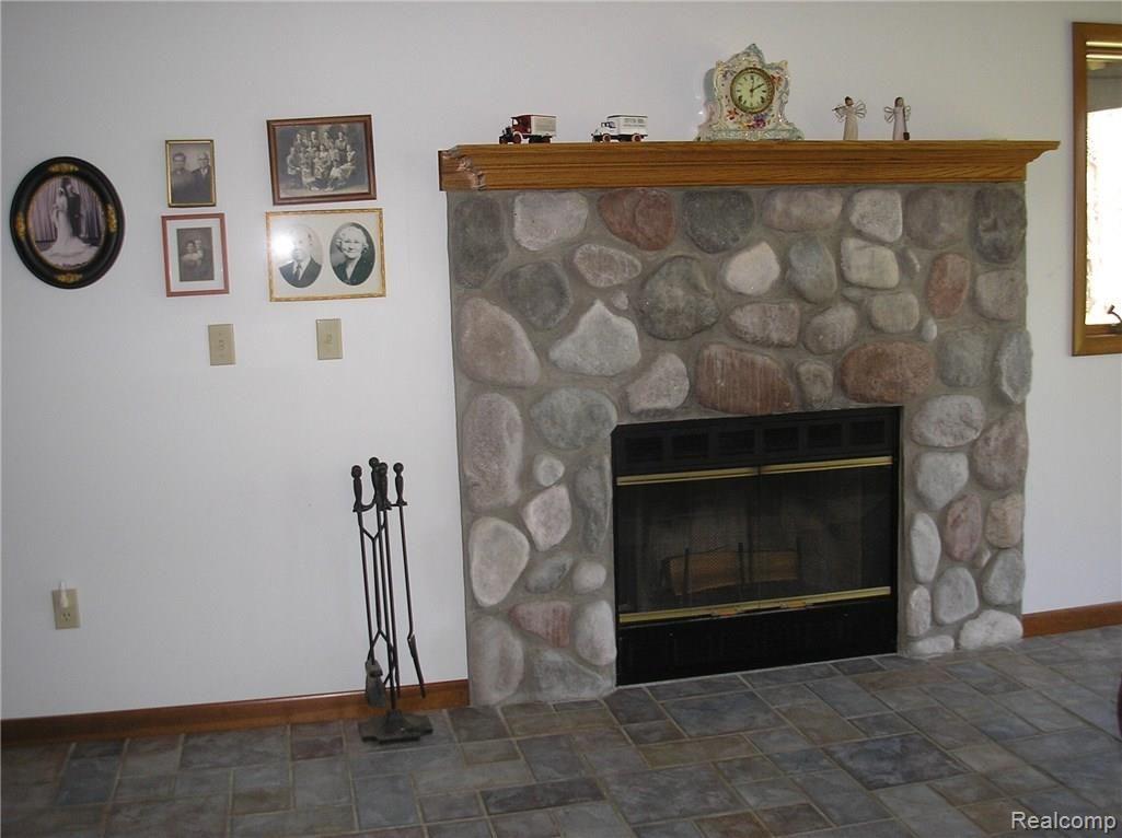 3901 Lee Hill Road Mayville, MI 48744 - Photo 20 of 23 3901 Lee Hill fire place in family room.jpg