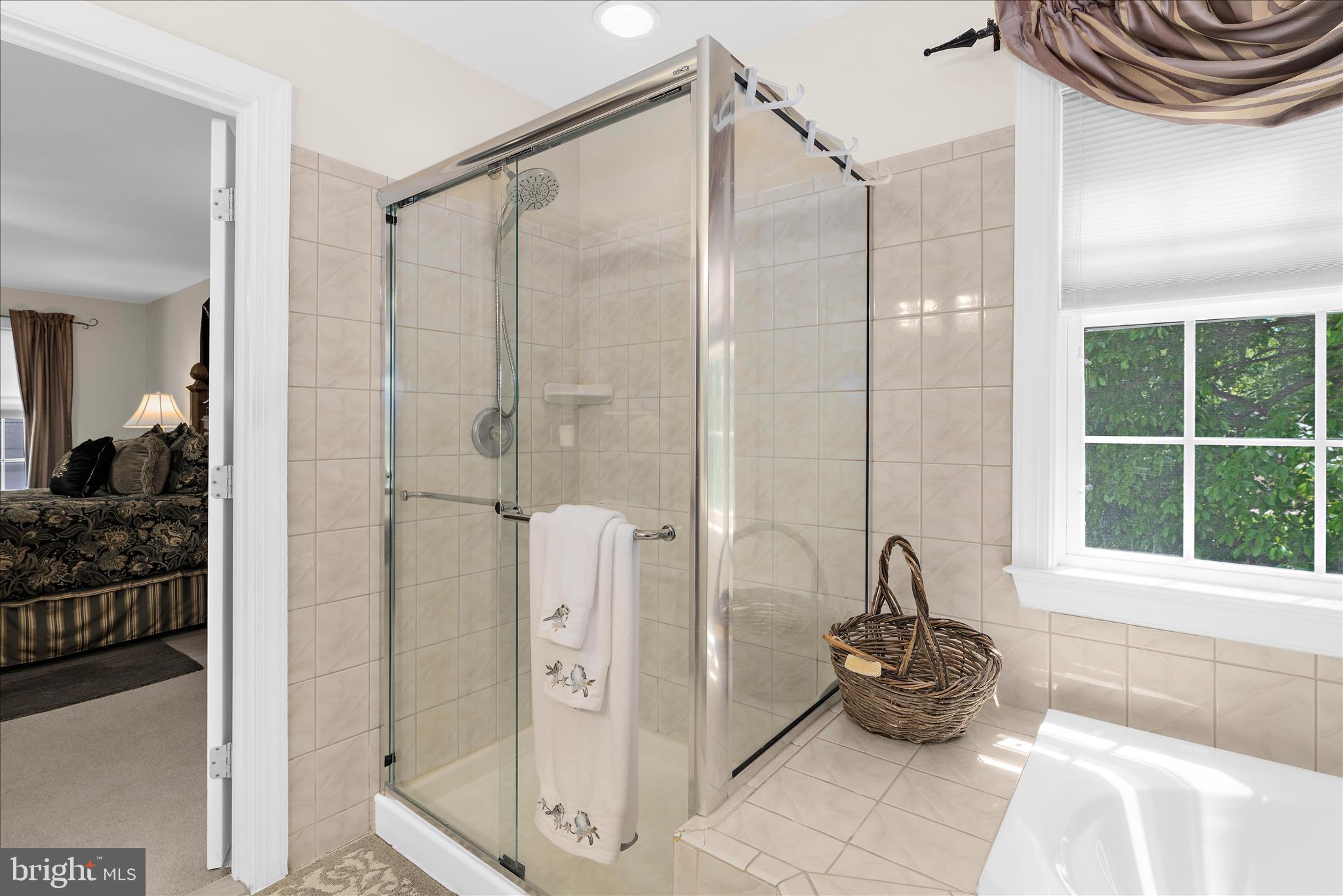 1848 Cherry Road Annapolis, MD 21409 - Photo 35 of 57 a bathroom with a tub and a window
