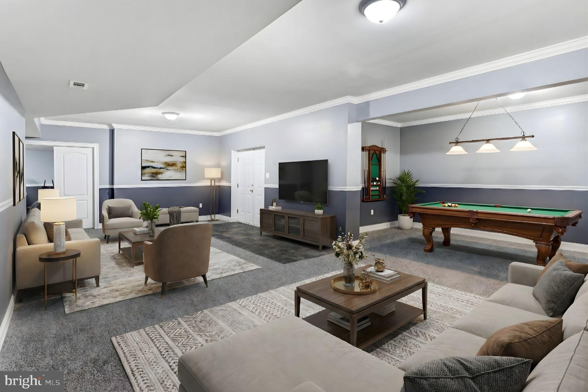 685 Telegraph Road Stafford, VA 22554 - Photo 22 of 30 a living room with furniture and a flat screen tv