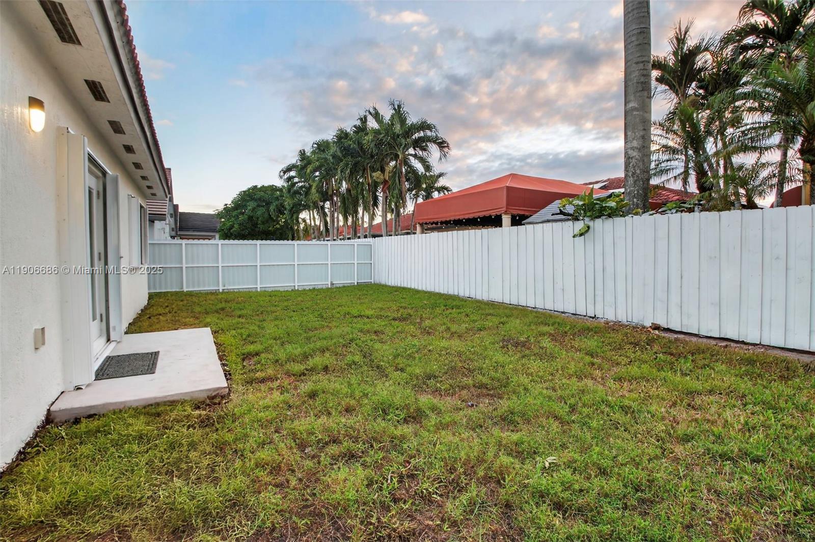 5302 Southwest 164th Place Miami, FL 33185 - Photo 37 of 43 a view of a backyard with a garden