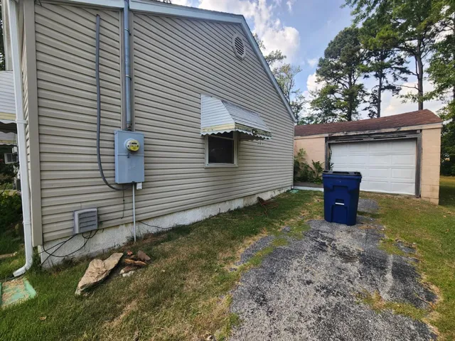 a view of a back yard of the house