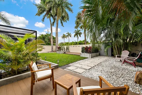 a view of a backyard with a patio