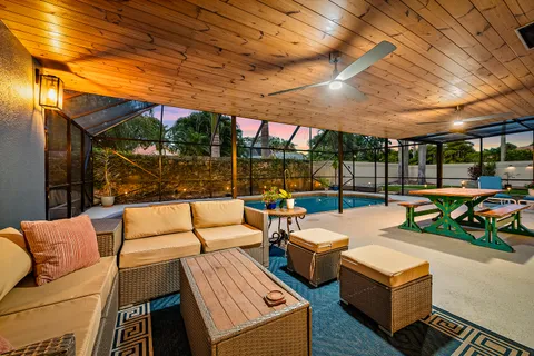 a outdoor space with patio couches and a potted plant