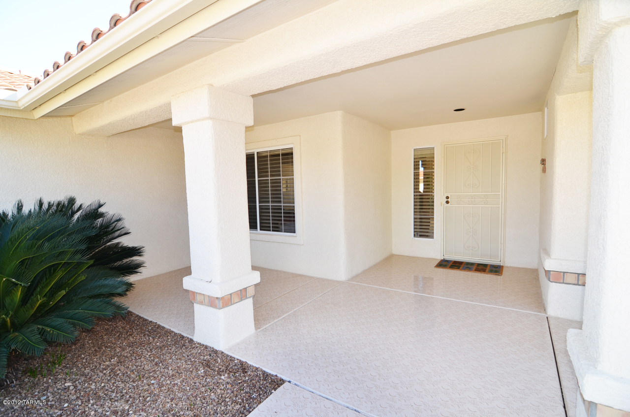 1330 East Crown Ridge Drive Tucson, AZ 85755 - Photo 21 of 22 a view of an entryway with wooden floor